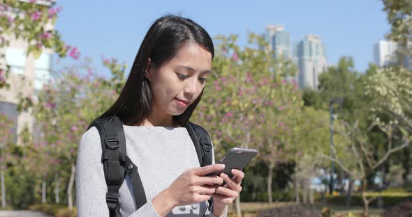 Woman use of smart phone at outdoor