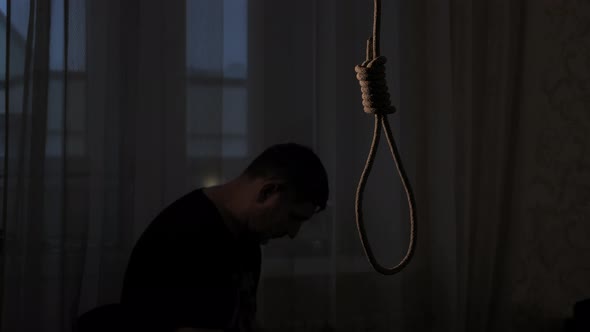 Depressed Man Contemplating Suicide