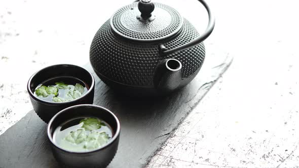 Traditional Eastern Metal Teapot and Iron Cups