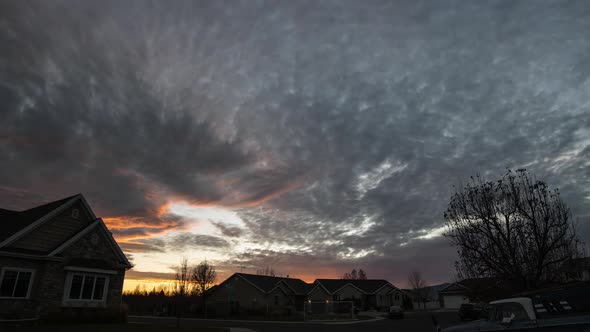 Bright and colorful sunset over neighborhood on Thanksgiving