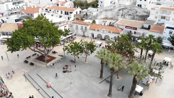 4k Drone footage of a plaza in the resort town of Albufeira, Algarve region of Portugal