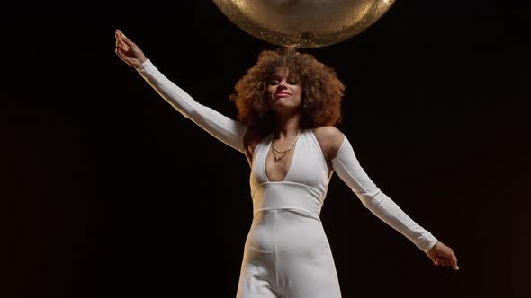 Smiling African American Woman with Afro Style Hairs Dancing on the Stage