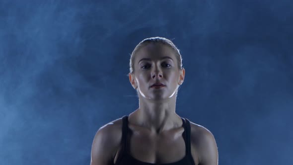 Woman Boxer Warms Up Muscles Before the Fight. Close Shot