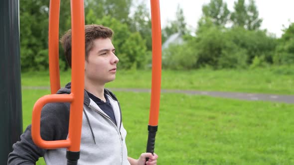 Close-up of a teenager while training on a street sports equipment