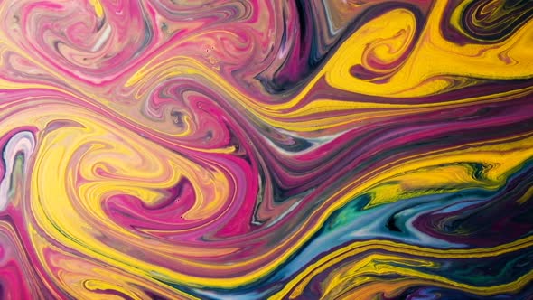 Abstract Psychedelic Background. Multicolored Paints Slowly Pour Into Patterns in Milk Slow Motion