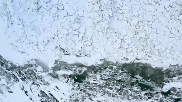 Ice Melting In A Lake, Aerial Footage Revealing Warming Temperatures Melting Ice In Water. Climate C