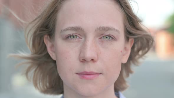 Close Up of Woman Looking at Camera