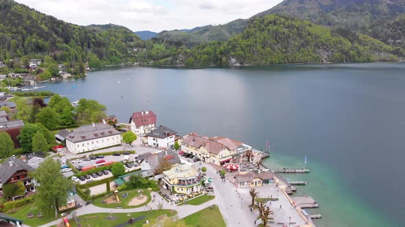 Aerial View of Mountain Lake Wolfgangsee with Houses of Resort Town in Austria, Alps