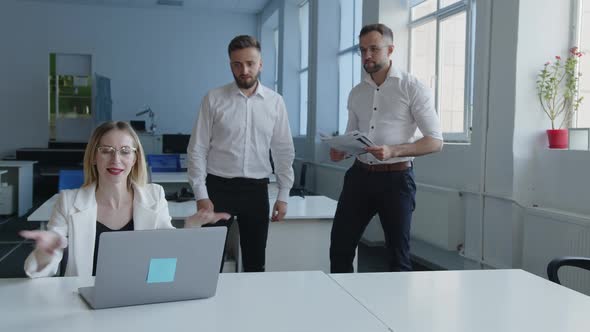 Slow Motion of a Girl and Men That Work in an Office