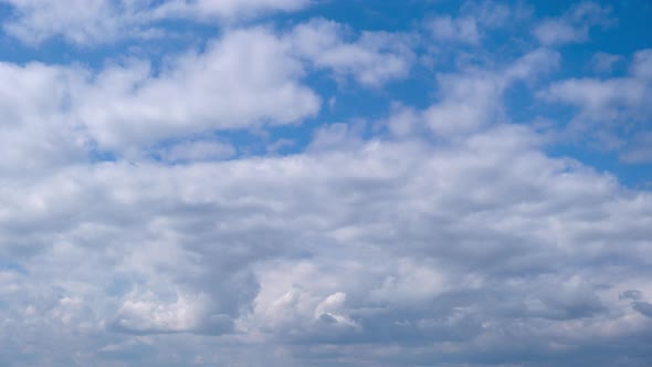 Cumulus Clouds Move in the Blue Sky Cloudscape Timelapse