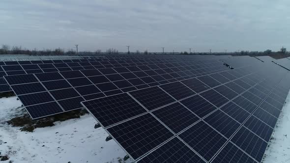 Drone Footage of a Solar Power Station in Winter with Lots of Snow