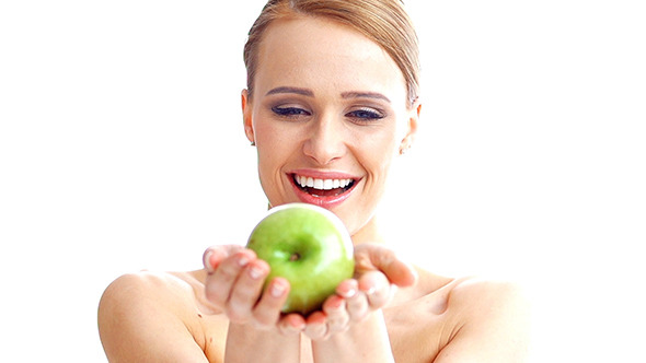 Sexy Blond Woman Holding Green Apple