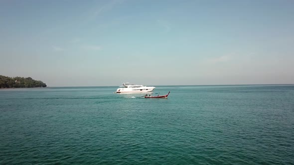 Aerial footage of a Thai boat in Phuket Island.