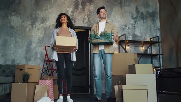 Multiracial Couple Moving Into New Apartment