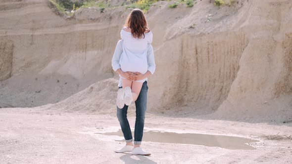 Boyfriend Holding Girlfriend While Having Date in Career