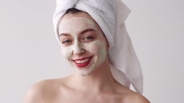 Skin Detox Home Spa Woman with Green Mask on Face