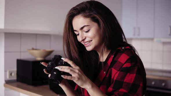 Closeup Footage of a Young Brunette Girl Looking Into the Camera and Laughing