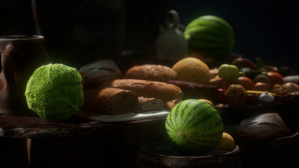 Food Table with Wine Barrels and Some Fruits Vegetables and Bread alt