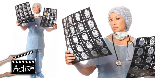 Female Surgeon Examining Mri  alt