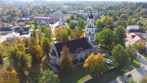 Latvia, Aluksne Old Lutheran Church With Golden Cock Statue on the Top of Tower, Aerial Dron 4K Shot