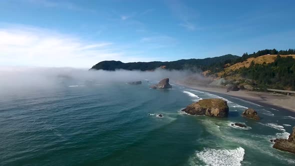 AERIAL: Flyover of the Oregon coastline.