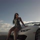 Model sitting on car - VideoHive Item for Sale