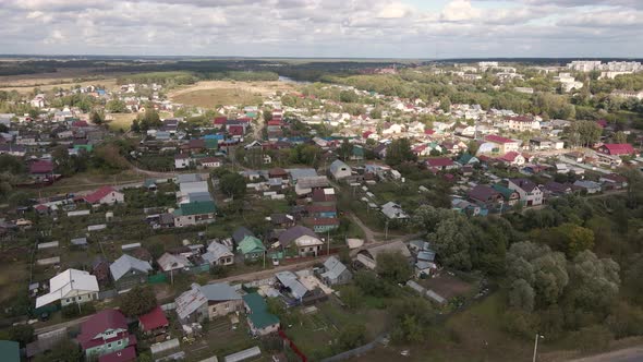 Flight Over the Countryside with Small Onestory Houses