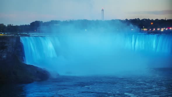 Day To Night Timelapse: Niagara Falls in the Form of a Horseshoe. It Is Illuminated By Lights