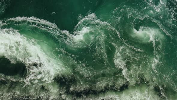 Waves of Water of the River and the Sea Meet Each Other During High Tide and Low Tide