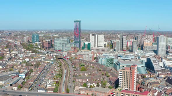 Dolly back drone shot of Croydon London on a sunny day