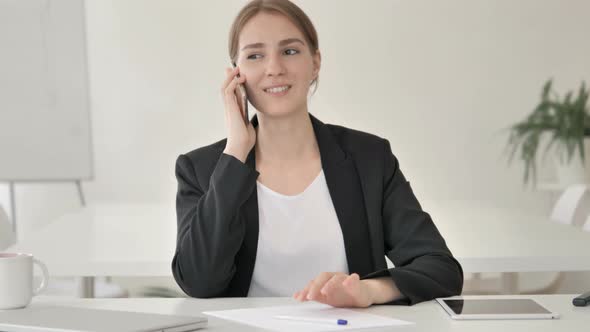 Young Businesswoman Talking on Phone