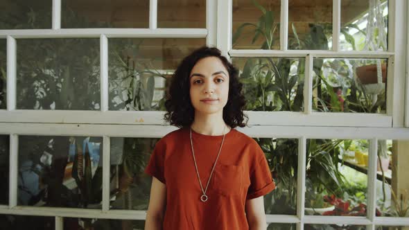 Portrait of Pretty Mixed Race Girl in Indoor Garden