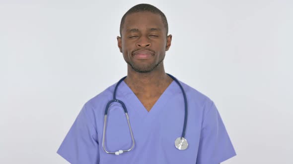 Serious African Doctor Looking at the Camera on White Background
