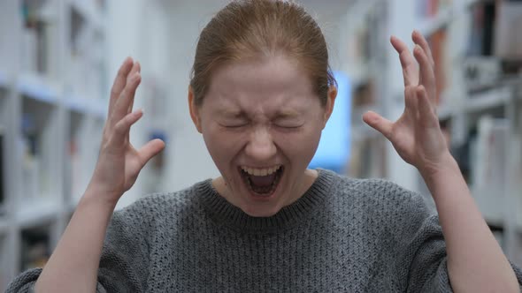 Portrait of Screaming Young Woman, Shouting in Cafe