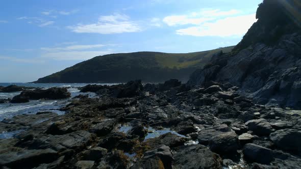 Slow Aerial Flight Over the Rugged Cornwall Coastline