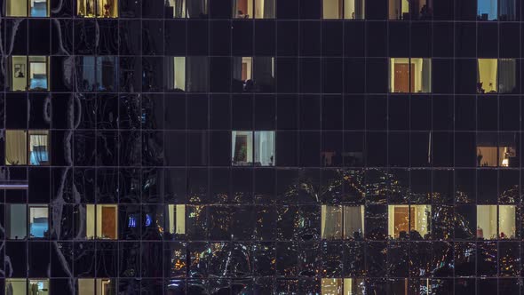 Big Glowing Windows in Modern Office and Residential Buildings Timelapse at Night