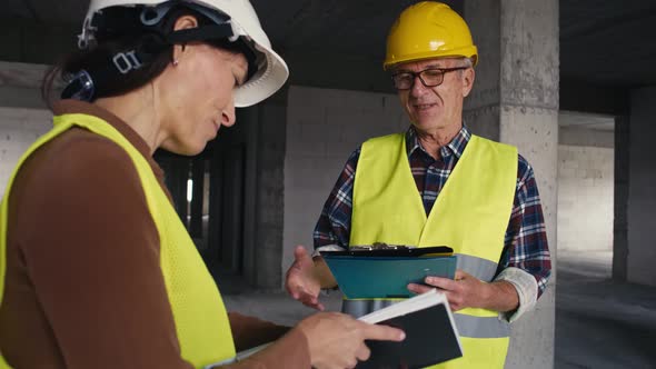 Male and female caucasian engineers