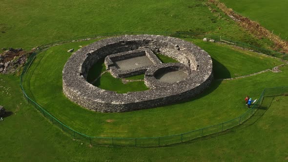 Loher Ringfort, Kerry, Ireland, March 2022. Drone orbits the ancient monument from the southeast whi