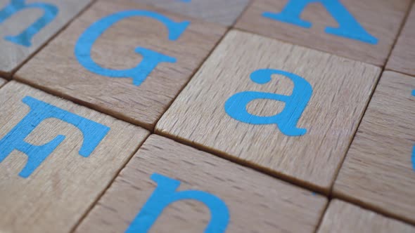 Macro Wooden Cubes With English Alphabet Slider Shot