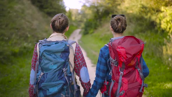 Tourist Couple Traveling, Walking In Nature.