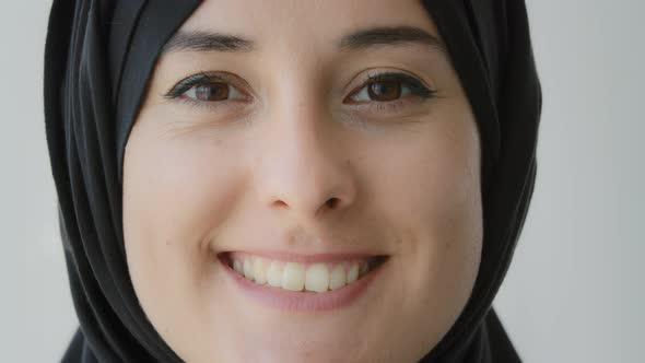 Extreme Closeup Female Portrait Indoors 20s Smiling Arabian Lady Smile Toothy Dental with White