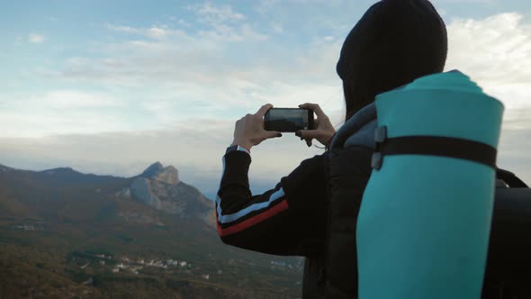 Girl on Mountain Top, Female Tourist Taking Photo of on Cell Smart Phone, Young Woman Traveler on a