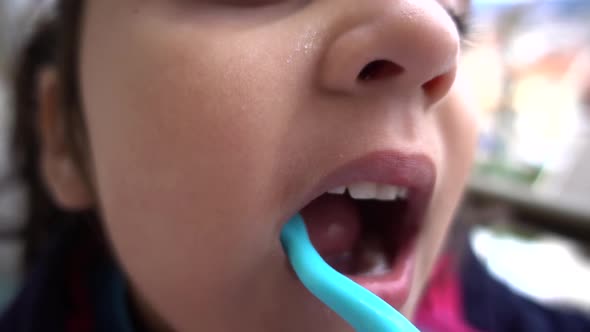 Child Brushing Teeth