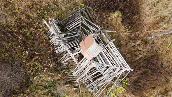 In the Field a Rural House with a Collapsed Roof Aerial View