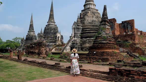 Ayutthaya Thailand at Wat Phra Si Sanphet Women with a Hat and Tourist Map Visiting Ayyuthaya