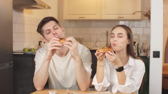 Young Couple Ordered Pizza at Home