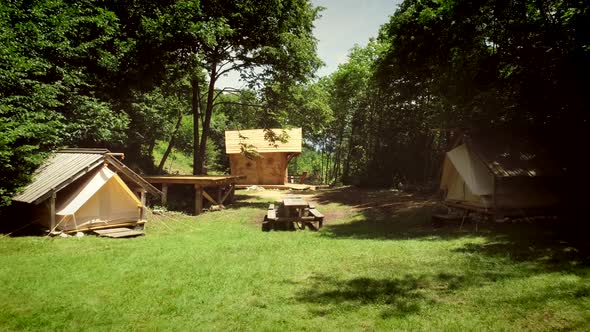 Aerial view of a traditional wooden house in a summer camp located in the forest