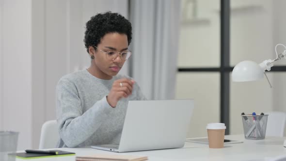 No Gesture By African Woman with Laptop