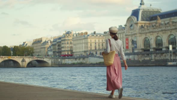 Young woman walking in Paris