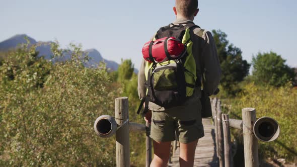 Caucasian man hiking in nature